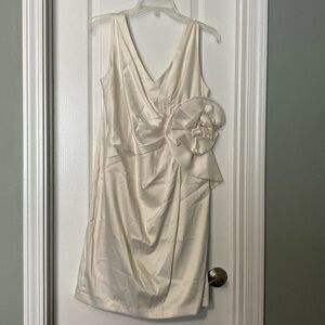 Cream color dress . On trend with flower design.